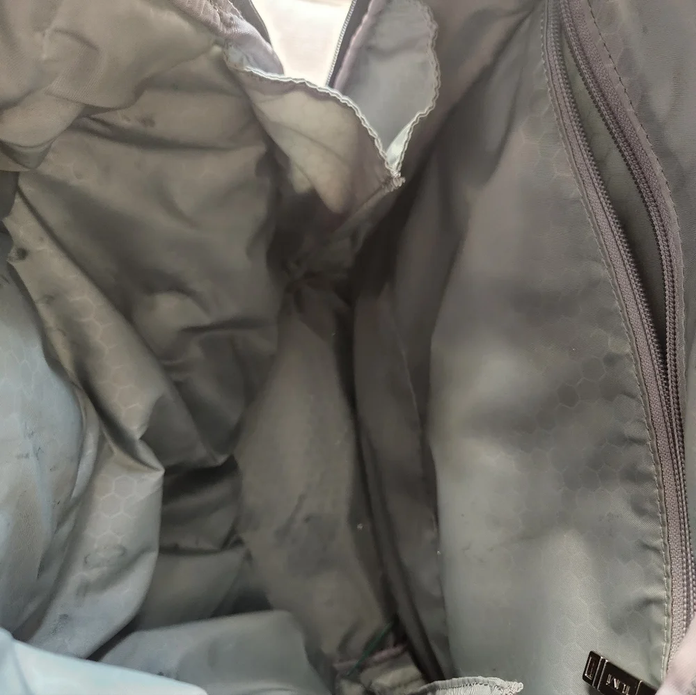 Tumi Black and Cream Backpack
